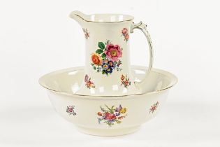An NHP toilet jug and basin set, printed with floral sprays. Bowl diameter 41 cm.