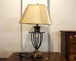 Metal table lamp with gold coloured shade,