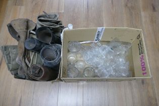 Two boxes of vintage leather gaiters and glassware