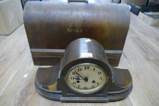 Wooden mantel clock and cased Singer sewing machine