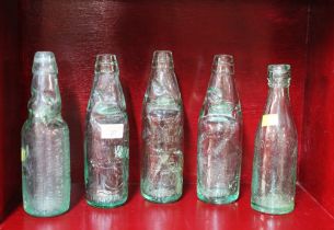 Five glass brewery and COD bottles, Brothwell and Mills of Workington,