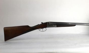 A Lig 12 bore side by side shotgun, with 27 1/2" barrels, half and three quarter choke,