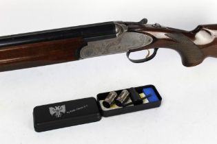 An Emilio Rizzini & Co 12 bore over/under shotgun, with 27 1/2" multi choke barrels, 70 mm chambers,