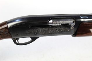 A Remington model 1100 12 bore semi automatic shotgun, with a 25" barrel, 2 3/4" chamber,