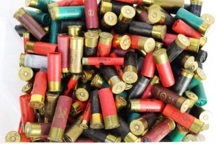 A tub of +/- three hundred and forty shotgun cartridges, the majority 12 bore, lead,