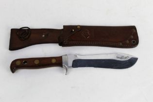 Puma White Hunter knife with 6" blade and hardwood scale handles,