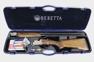A Beretta 691, 12 bore over/under shotgun with 30" multi choke barrels,