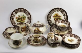 A large quantity of The Royal Worcester Group Paisley Game Series dinnerware, comprising plates,