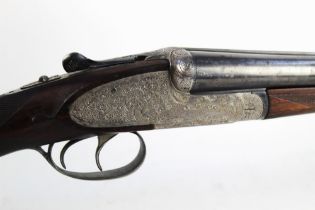 An AYA No 2 12 bore side by side shotgun, with 26" barrels, improved and quarter choke,