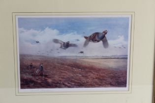 Archibald Thorburn, two signed coloured prints, the first depicting grey and red leg partridge.