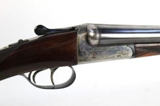 An AYA 12 bore side by side shotgun, with 26" barrels, cylinder and quarter choke, 70 mm chambers,