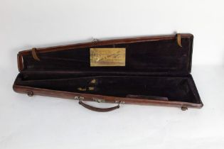 A Cogswell & Harrison leather shotgun case,