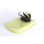 A cold painted bronze and marble ashtray in the form of three trout, mounted on a marble base.