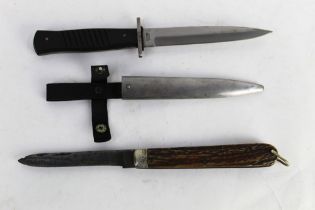 A Victorian folding knife, blade length 5 3/4", together with a German military style knife,