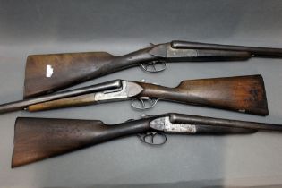 Three 12 bore side by side shotguns, P J McGee of Newport, side by side with 27 3/4" barrels,