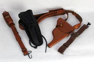 A leather ammunition belt with pistol holster,