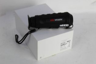 A Hikvision thermal monocular Model DS-2TS01-06XF/W with box, charger, instructions etc.