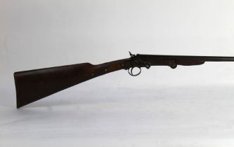 A Belgian 410 single barrelled shotgun, with 28" barrel, cylinder choke, 65 mm chamber, side lever,