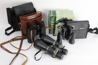 Three pairs of binoculars, Bushnell Birder 8 x 40, Denhill 10 x 50 and Traveller 10-30 x 60.