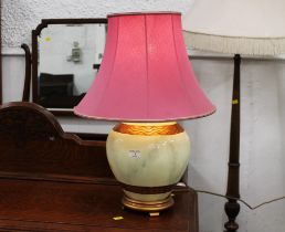 Squat bulbous ceramic lamp with shade