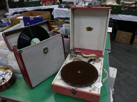 Portable gramophone "The Scala" and box of Bakelite records