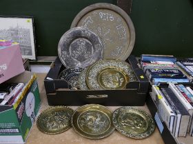 Quantity of brass chargers and plaques