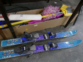 Box of brooms, mops, pair of Elan ski's,