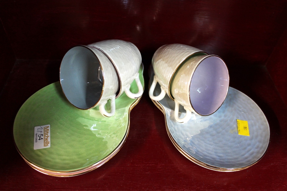 Four Maling lustre cups and saucers