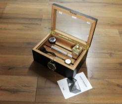 Wooden cigar humidor with pipes,