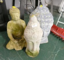 Three Buddha head garden ornaments