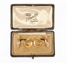 A pair of Arts & Crafts style gold cufflinks, stamped 15 ct and with makers mark T.C.