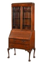 An early 20th century mahogany bureau bookcase,