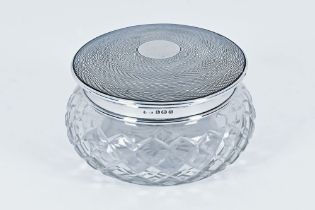 A silver lidded cut glass powder bowl, Birmingham mark 1932, makers mark rubbed, top diameter 9.