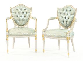 A pair of early 20th century Gillows armchairs,