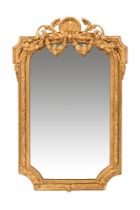 A 19th century gilt rectangular wall mirror, with composite gilt decoration. 94 cm high.