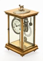 An early 20th century four glass brass mantel clock,