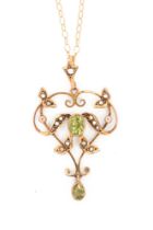 A Victorian 9 ct gold peridot and seed pearl set pendant, the chain stamped 9 k, gross weight 2.