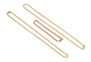 Two gold coloured necklaces and a gold coloured bracelet, each with 9 ct gold stamped lobster clasp,