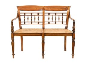 A late 20th century period style satinwood salon seat,