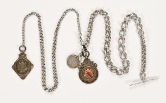 Two silver pocket watch Albert chains, with coins, fobs etc, one engraved Marlborough Musketry C.S.