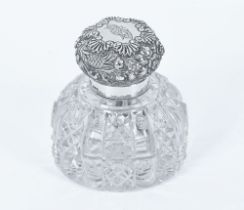 A Victorian silver lidded cut glass Capstan inkwell of large form, London mark 1890,