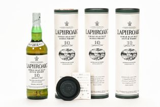 A collection of three bottles of Laphroaig single Islay malt Scotch whisky, 10 years old.