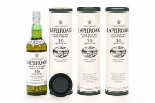 A collection of three bottles of Laphroaig Islay single malt Scotch whisky, 10 years old.