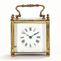 A brass carriage clock,