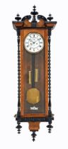 A Victorian walnut ebonised Vienna type regulator wall clock,