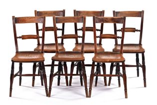 A set of six 19th century beech and elm kitchen chairs, having rail backs,