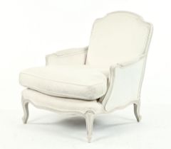 A 20th century period style armchair, in the Louis XV style,