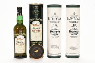 A collection of three bottles of whisky, to include two Laphroaig Islay single malt Scotch whisky,