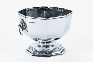 A silver sugar basin, with lion mask and ring handles, Chester mark 1909, makers mark rubbed.