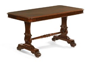 A Victorian mahogany rectangular side table, the moulded top above foliate carved and turned feet.